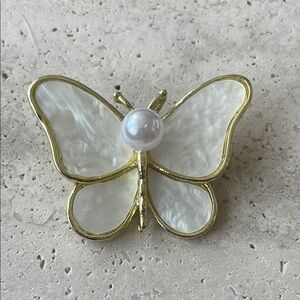 Elegant Gold and White Butterfly Brooch